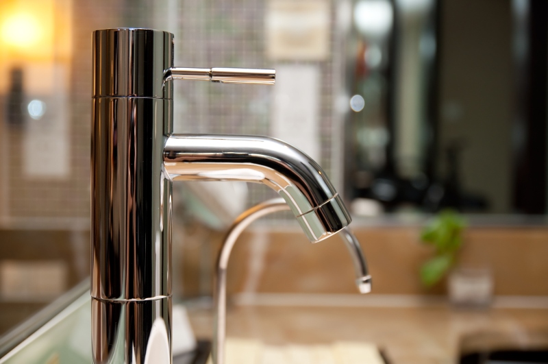 Leaking tap being repaired in Beckenham